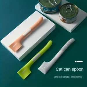 Long-handle pet canned feeding spoon on a plain background